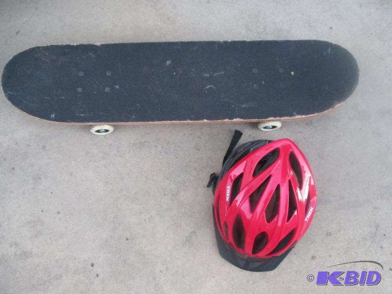 lot 188 image: skate board and helmet...
