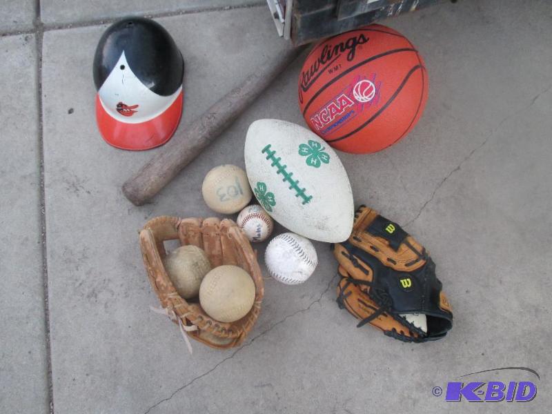 lot 189 image: assorted balls, glove,and helmet...