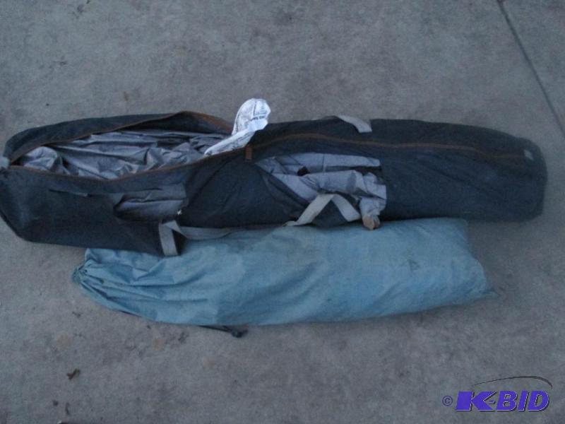 lot 198 image: tent tear in bag...