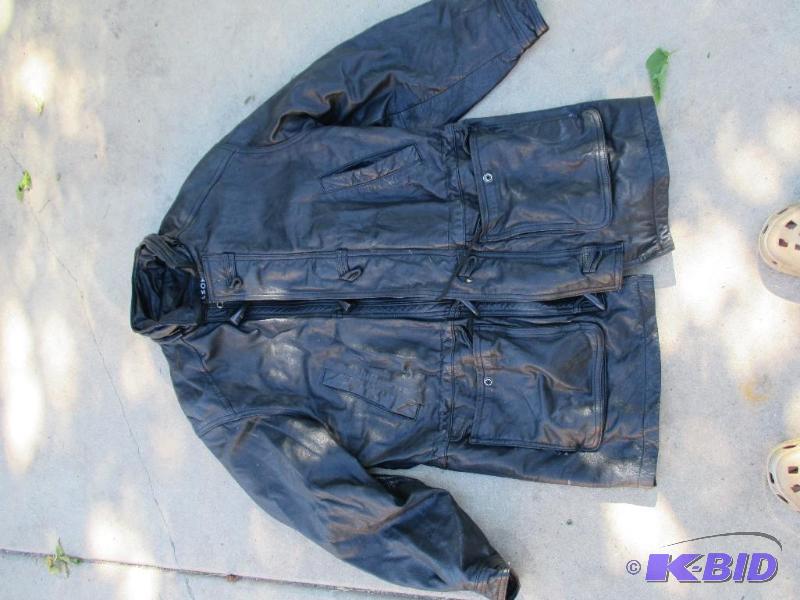 lot 26 image: used Wilsons leather jacket, medium sized bla...