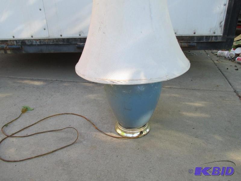 lot 34 image: blue lamp with cream colored shade...