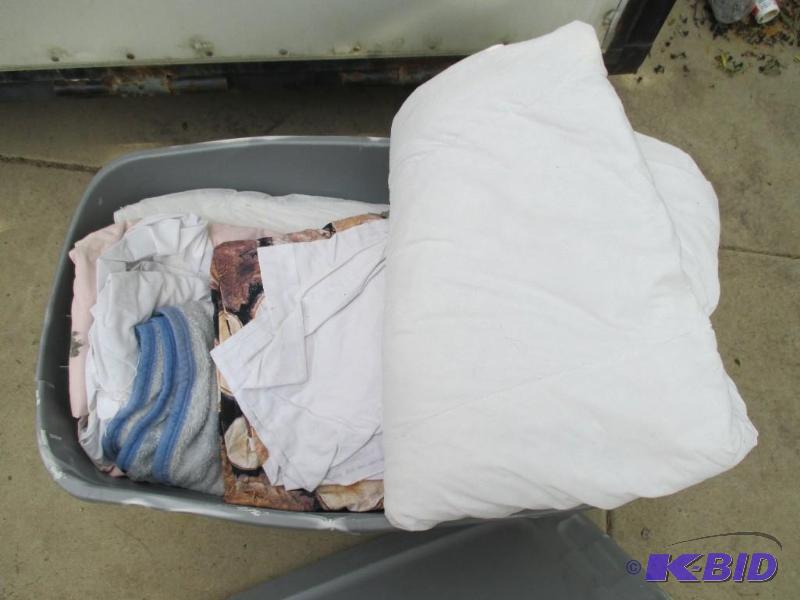 lot 55 image: big bin of bedding, various sheets and blanke...
