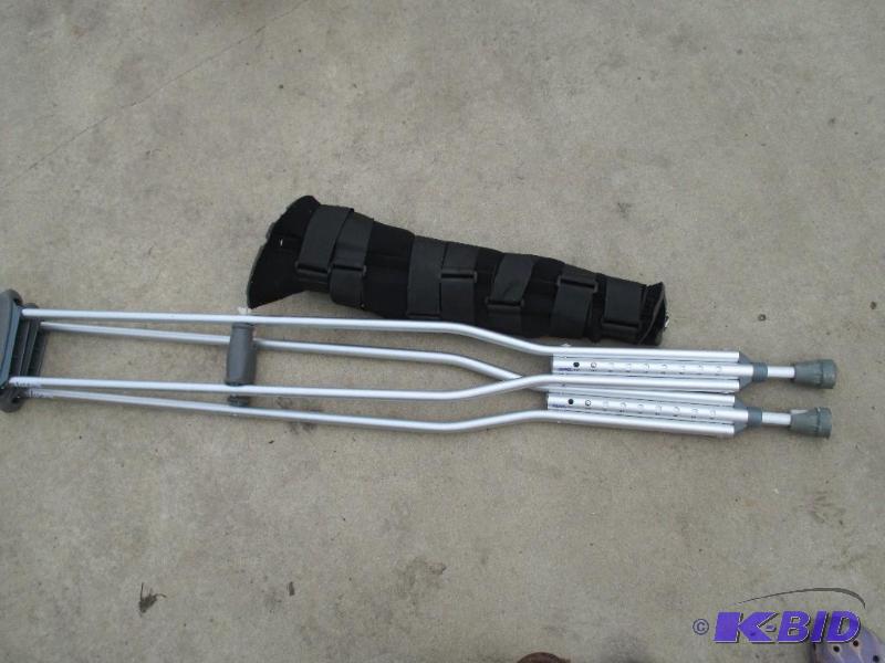 lot 58 image: cast and crutches...