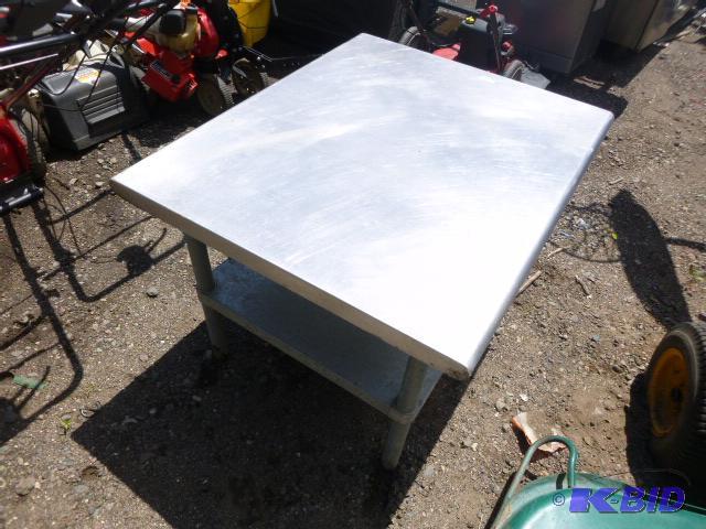 lot 9 image: Small Stainless Steel Table 27&quot H X 36&q...