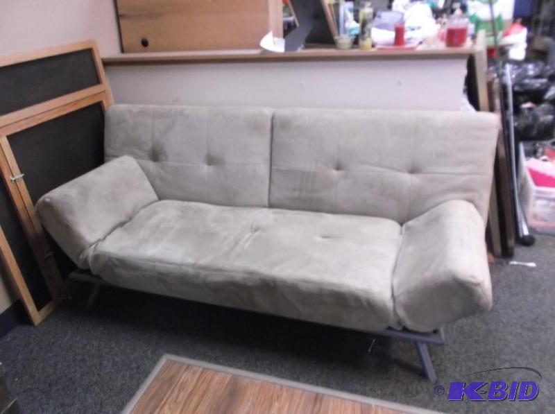 lot 1 image: Tan Microfiber Folding Couch Bed - Used, Some...