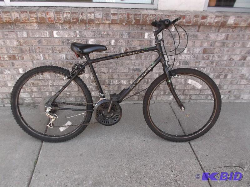 lot 16 image: Huffy Mountain Bike - Some Wear - Seems To Ri...
