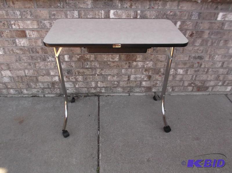 lot 19 image: Rolling Table, Has Small Drawer, I Believe Th...
