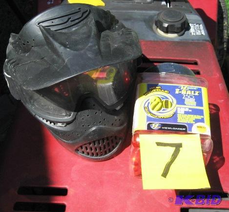 PARTIAL CONTAINER OF PAINT BALLS AND A PAINT ...