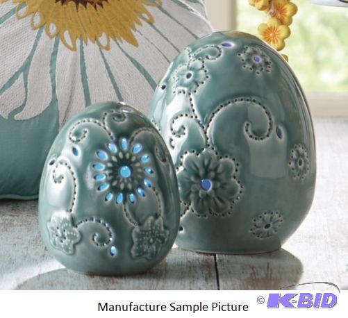 Two LED Eggs -&nbspPierced, embossed ceramic...