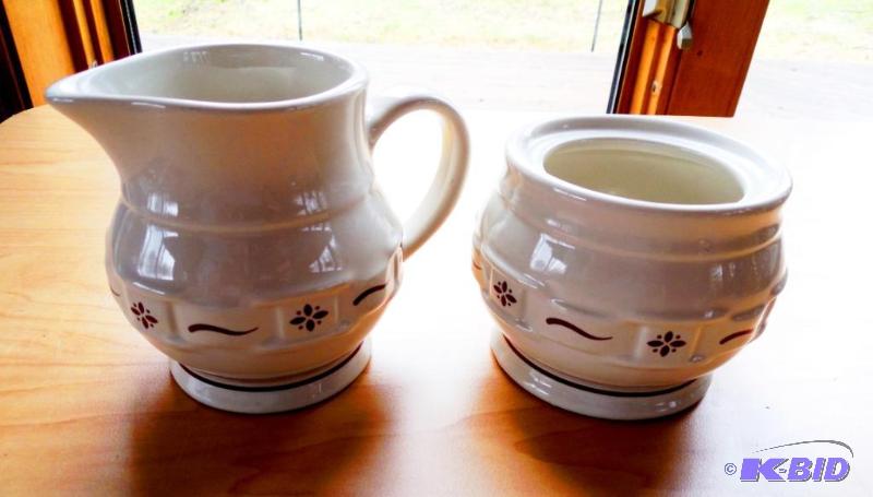 lot 21 image: Stylish Longaberger Red Woven Traditions Cream & Sugar Bowl