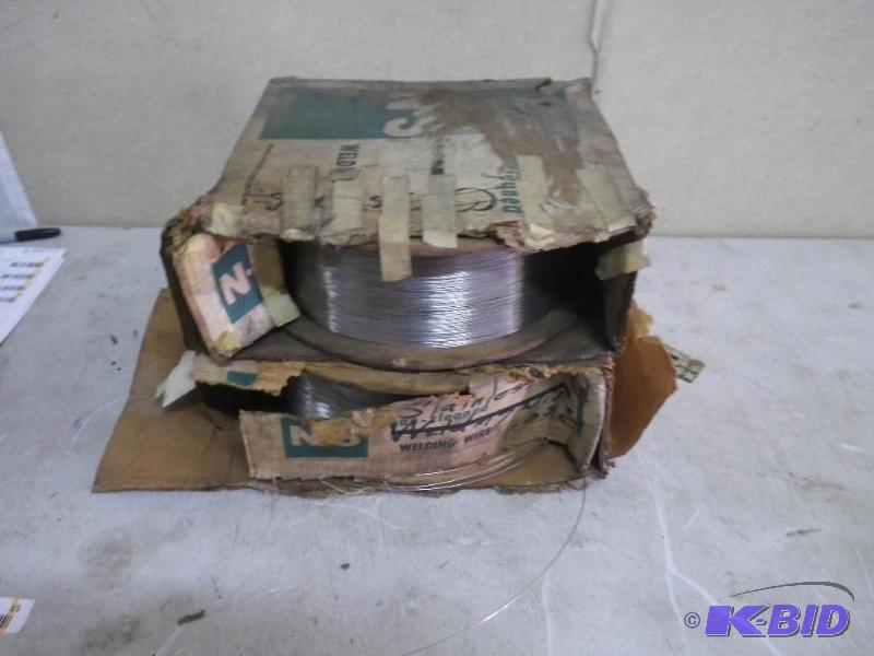2 near full rolls of wire, 1 is marked SS...