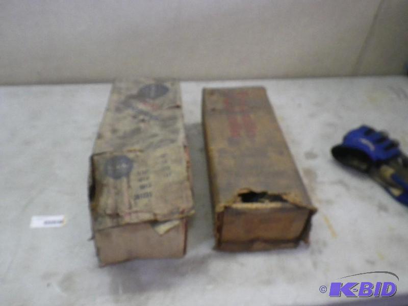 2 partial boxes welding rods...