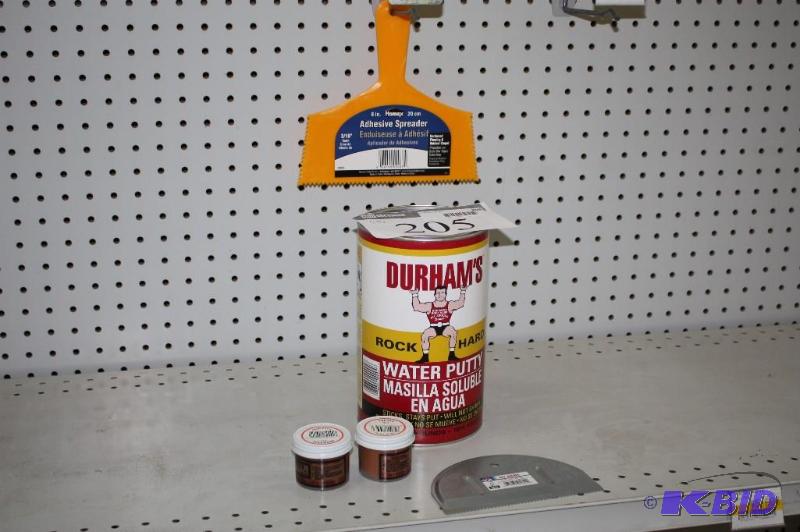 A collection of various putty and putty tools...