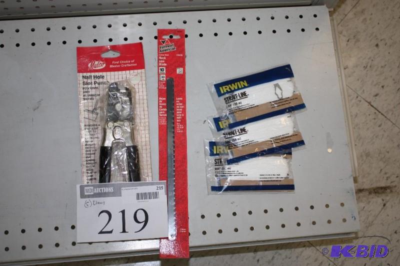 A collection of various tools including a nai...