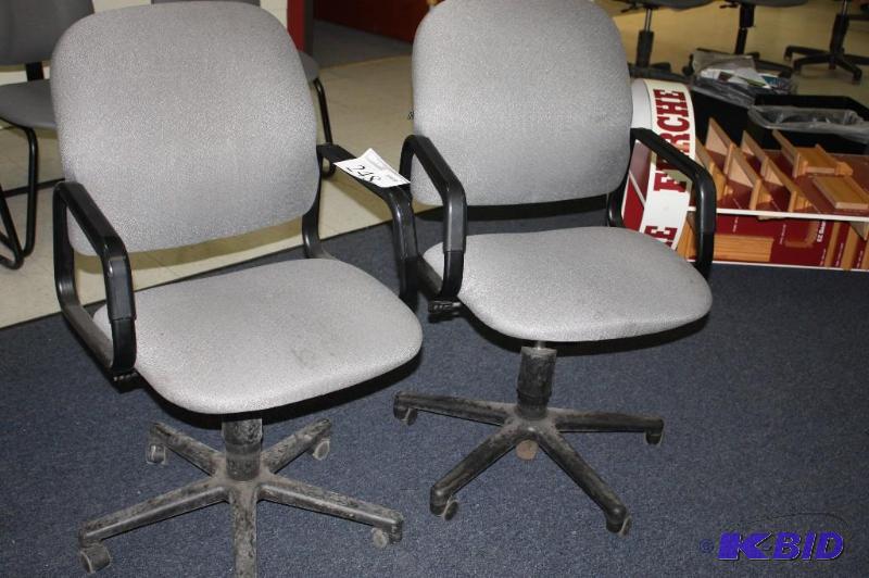 (2) Office chairs on rollers with armrests...