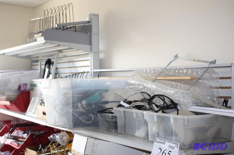 Collection of various pegboard, hangers and c...