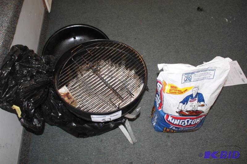 lot 53 image: Weber Grill and bag of charcoal ...