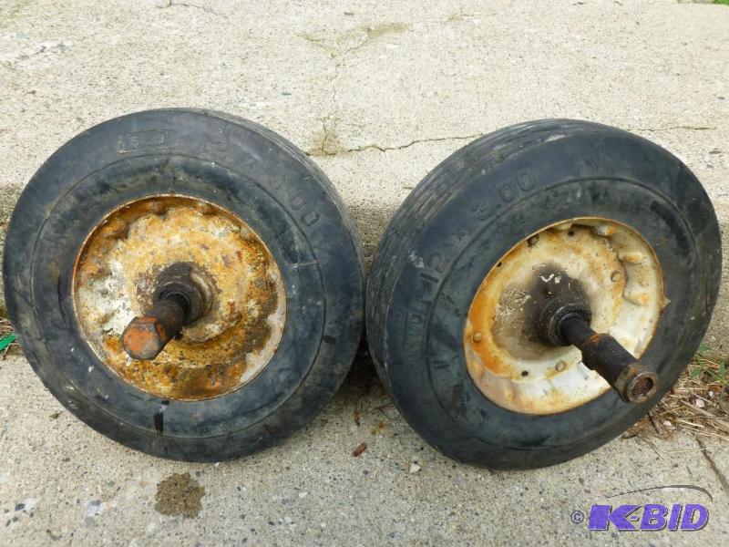 Lot of two heavy duty solid rubber rim mounte...