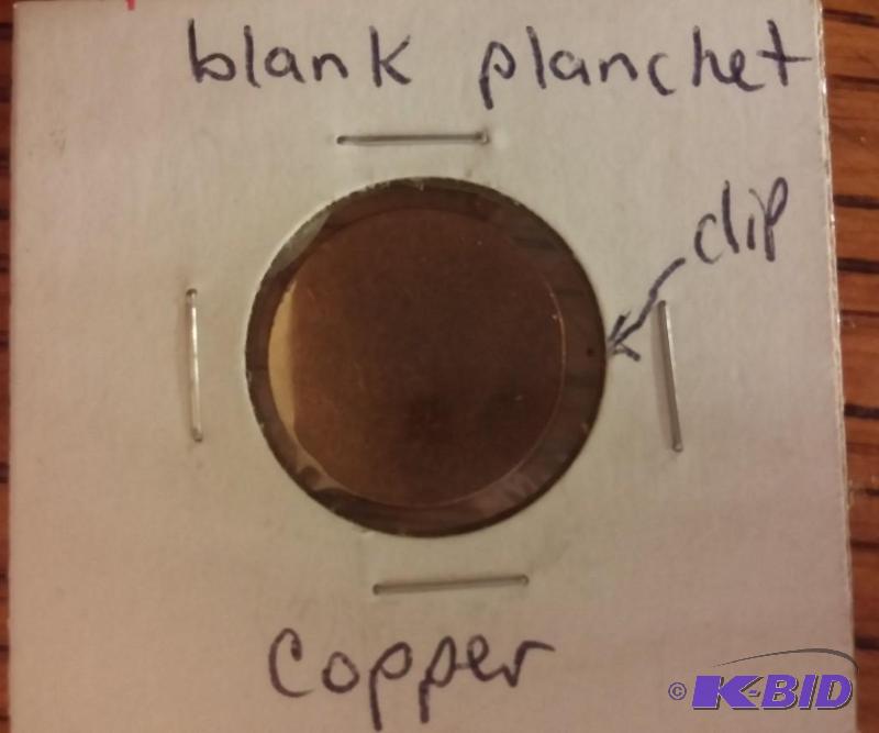 ONE CENT COPPER BLANK PLANCHET WITH CLIP...