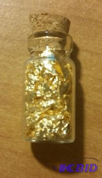 1 VIAL OF GOLD FLAKES...