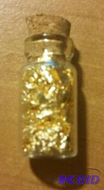 1 VIAL OF GOLD FLAKES...