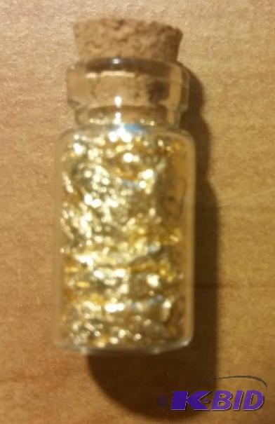 1 VIAL OF GOLD FLAKES...