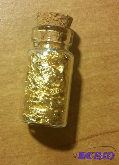 1 VIAL OF GOLD FLAKES...