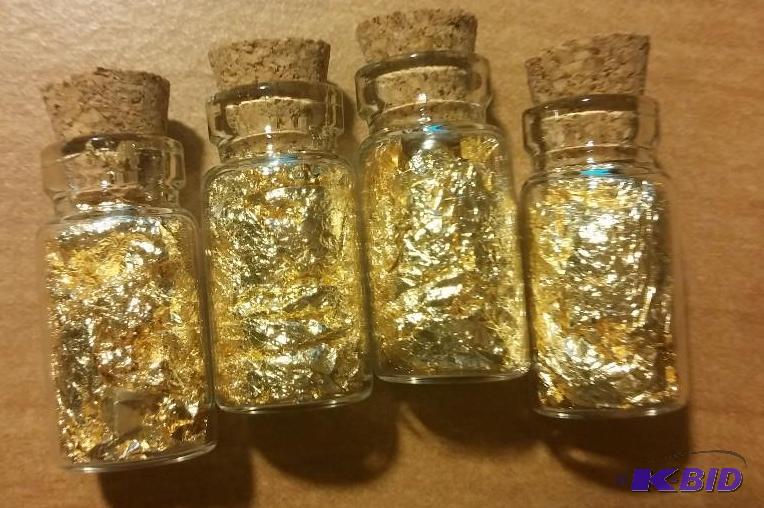 4 VIALS OF GOLD FLAKES...