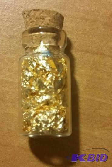 1 VIAL OF GOLD FLAKES...