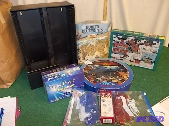 lot 39 image: Lot Of Puzzles, Poker Chips, CD Rack...