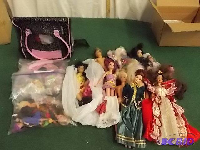 lot 71 image: Lot Of 13&nbspAssorted Barbies, Clothes, Han...