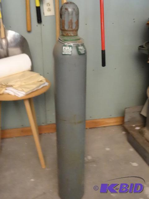 lot 12 image: Full oxygen welding tank...