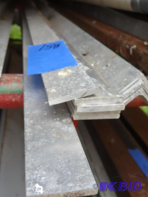 lot 158 image: Aluminum stock. 1 12 x 144. Qty 7. 1 12 x 1...
