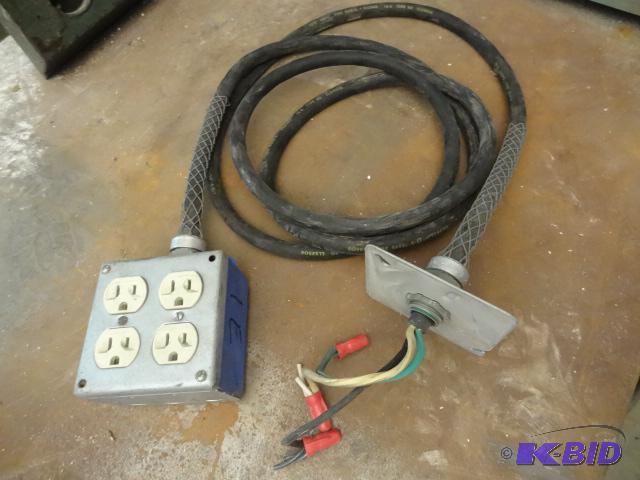 lot 1E image: Hard wire 4 plug box. 110 volt...