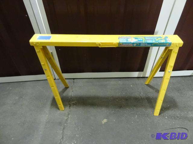lot 56 image: Yellow metal fold up saw horse. Extendable...