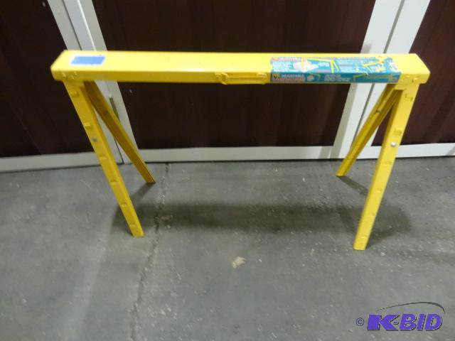 lot 59 image: Yellow metal fold up saw horse. Extendable...