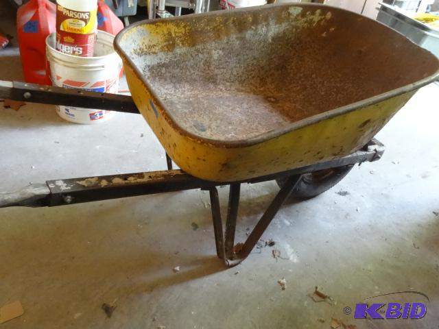 lot 62 image: Steel wheel barrow with air filled tire...