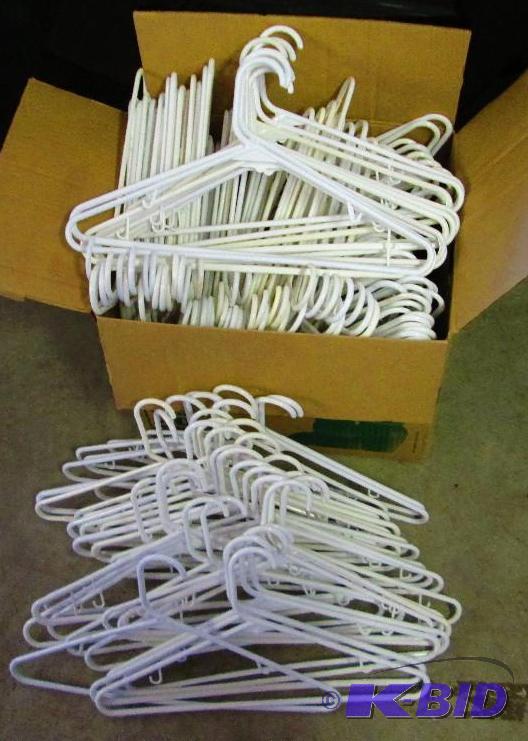 lot 143 image: large lot of plain white adult hangers...