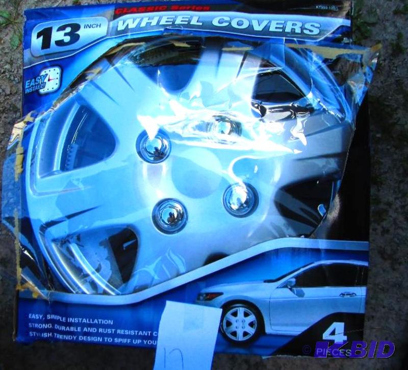 lot 17 image: Set of 4 13 inch wheel covers...
