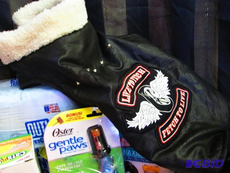 lot 186 image: Biker dog jacket, piddle pads, pooper scooper...