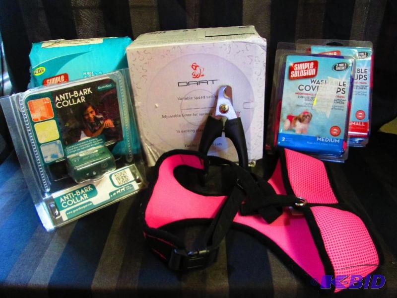 lot 187 image: Laser toy, Dog diapers, nail trimmer, bark co...