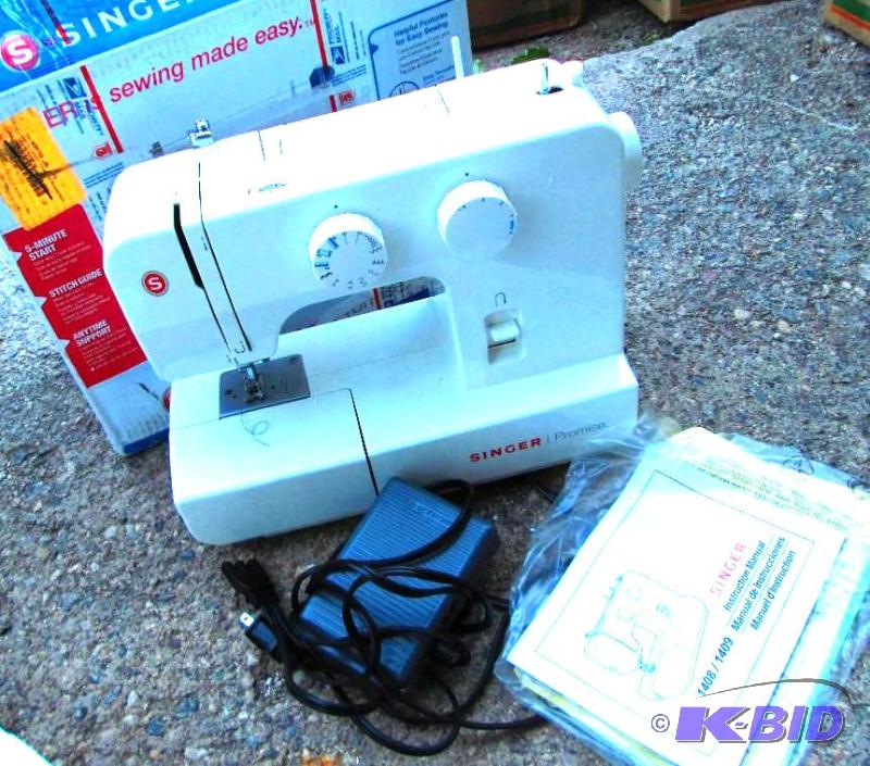 lot 51 image: Singer promise 1409 sewing machine, appears t...