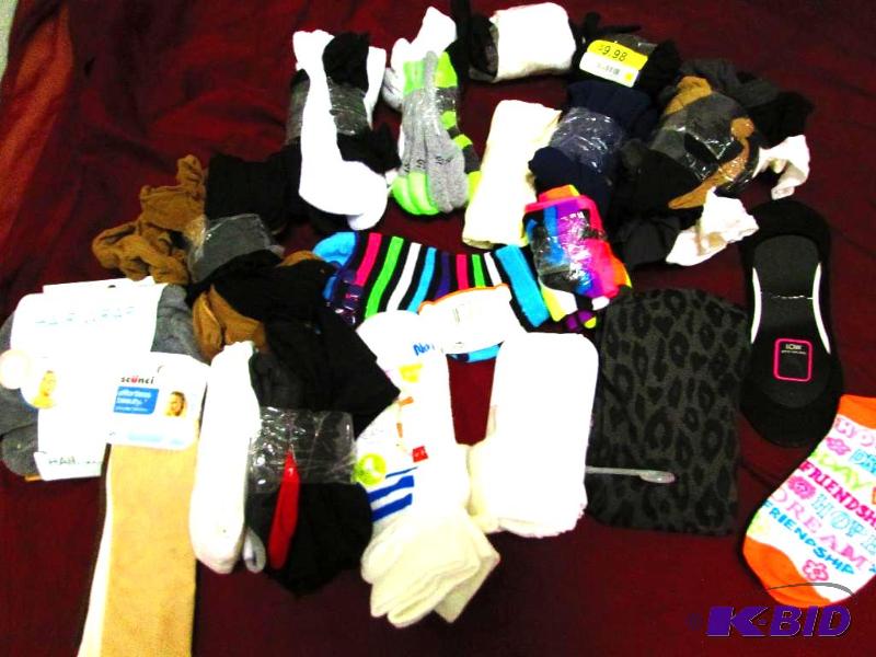 lot 65 image: Assorted socks and hair accessories, all new...