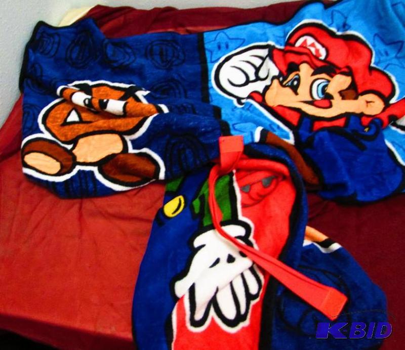 lot 71 image: Mario throw, with velcro closure strap...