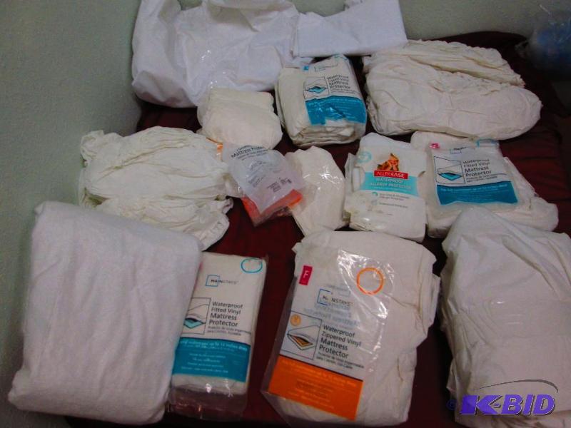 lot 83 image: Assorted mattress protectors, retail damaged ...