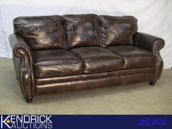 lot 19 image: New Colonial Brown Leather Sofa