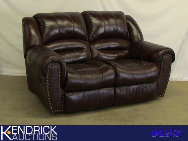 lot 23 image: New Expresso Colored DuraBlend Loveseat Dual Recliner