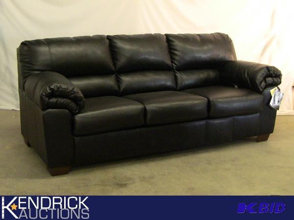 lot 25 image: New with Tags Ashley Signature Design Black Sleeper Sofa