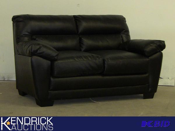 lot 26 image: Black DuraBlend Loveseat