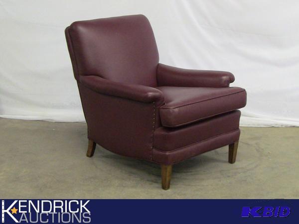 lot 36 image: New Wine Colored Faux Leather Chair